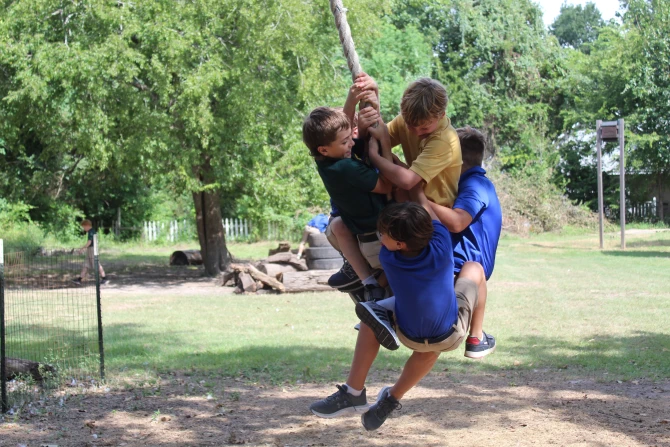 Western boys swinging