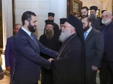 Greek Orthodox Patriarch John X Yazigi of Antioch and All the East (right) receives Ahmad al-Shar’a, the head of Syria’s transitional administration, on Oct. 26, 2025, at the patriarchal residence in Damascus.