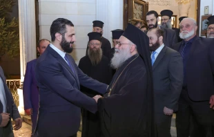 Greek Orthodox Patriarch John X Yazigi of Antioch and All the East (right) receives Ahmad al-Shar’a, the head of Syria’s transitional administration, on Oct. 26, 2025, at the patriarchal residence in Damascus. Credit: Syrian Presidency