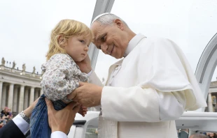 Pope Leo XIV greets a young child before his Wednesday general audience in St. Peter’s Square on Sept. 10, 2025. Credit: Vatican Media