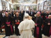 Pope Leo XIV greets participants in a seminar organized by the Pontifical Academy of Theology on Sept. 13, 2025, at the Vatican.