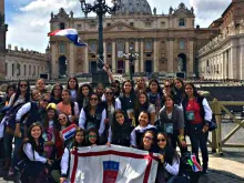 The Paraguayan teen girls pose in front of St. Peter's Basilica. Photo 