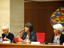 Italian journalist Marina Ricci (center) moderates the Vatican event on Oct. 19, 2013. 