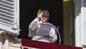 Pope Leo XIV addresses pilgrims gathered in St. Peter's Square at the Vatican for the Angelus on December 7, 2025.