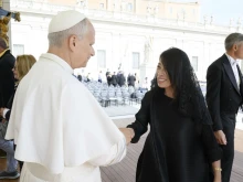 Teresa Lai greets Pope Leo XIV after the general audience in St. Peter’s Square at the Vatican on Wednesday, Oct. 15, 2025.