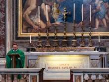 Archbishop Grzegorz Ryś of Łódź, Poland, celebrates Mass at St. John Paul II’s tomb in St. Peter’s Basilica, Feb. 24, 2022.
