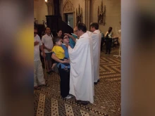 The blessing of throats for St. Blaise’s feast day.