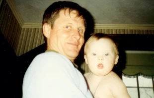 Tom Vander Woude with baby Joseph “Josie” Vander Woude. Credit: Photo courtesy of the Tom Vander Woude Guild