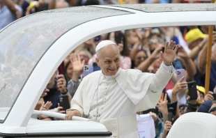 Pope Leo XIV waves at the crowds of people who braved a rainy morning for the general audience in St. Peter’s Square on Sept. 10, 2025. Credit: Vatican Media