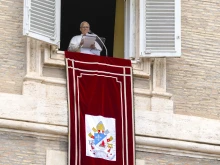 Pope Leo XIV speaks from a window of the Apostolic Palace overlooking St. Peter’s Square during the Sunday Angelus on Aug. 24, 2025.