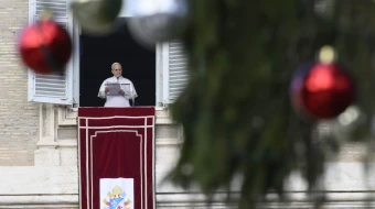 Pope Leo XIV addresses pilgrims gathered in St. Peter’s Square at the Vatican for the recitation of the Angelus on Dec. 26, 2025.