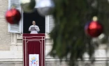 Pope Leo XIV addresses pilgrims gathered in St. Peter's Square at the Vatican for the recitation of the Angelus on December 26, 2025.