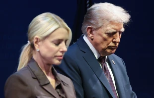 U.S. President Donald Trump bows his head in prayer with Attorney General Pam Bondi at the Museum of the Bible on Sept. 8, 2025, in Washington, D.C. Trump addressed the White House Religious Liberty Commission during the event. Credit: Win McNamee/Getty Images