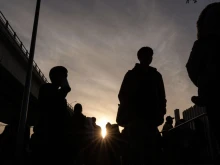 Asylum seekers wait for their CBP One appointments with U.S. authorities before crossing through El Chaparral port in Tijuana, Baja California state, Mexico, on Jan. 20, 2025.