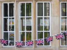 Union Jack bunting across the windows of Ely Court care home, in Cardiff, Wales. 