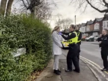 A pro-life woman is arrested for praying silently in alleged violation of a local buffer zone law.