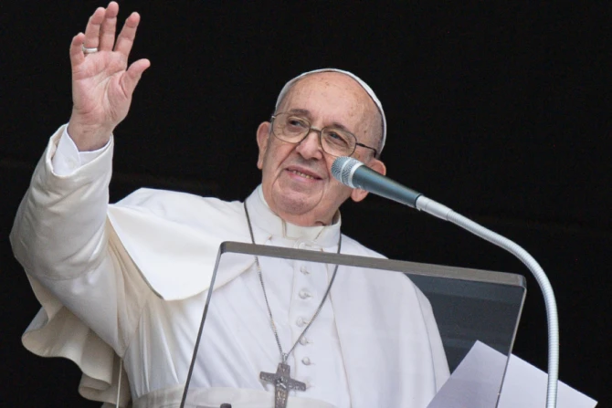 Pope Francis waves during his Angelus address at the Vatican, Aug. 2, 2021.