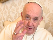 Pope Francis records a video message during a meeting with Bishop Stephen Chow.
