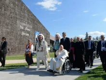 Pope Francis blesses the crowds at Ste. Anne Shrine at Lac Ste. Anne in Alberta, Canada.