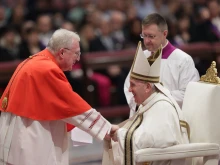 Pope Francis greets Cardinal Arthur Roche, prefect of the Vatican’s Dicastery of Divine Worship and the Discipline of the Sacraments, at the consistory in St. Peter’s Basilica on Aug. 27, 2022.