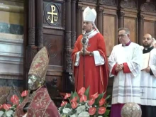 Archbishop Battaglia with the liquefied blood of Saint Januarius on Sept. 19, 2022