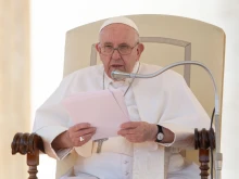 Pope Francis speaks in St. Peter's Square Oct. 15, 2022.