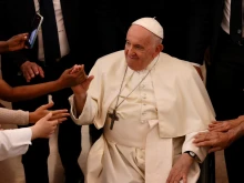 Pope Francis meets with charity workers at the Centro Paroquial de Serafina in Lisbon on Aug. 4, 2023.