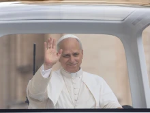 Pope Leo XIV waves to pilgrims gathered in St. Peter’s Square at the Vatican for his general audience on Sept.24, 2025.