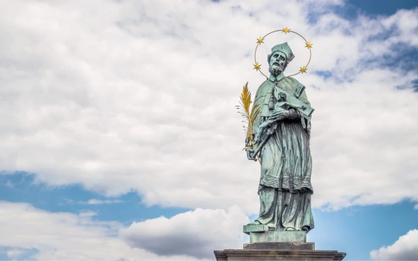 Sculpture in Prague of St. John Nepomucene, patron saint of Bohemia. Credit: Thoom/Shutterstock