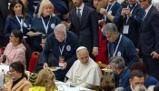 Pope Leo XIV shares lunch with people in need at the Vatican on November 16, 2025.