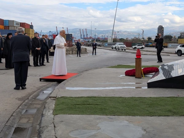 Pope Leo XIV prays in silence at the site of the 2020 port explosion in Beirut, Lebanon, on Dec. 2, 2025. Credit: AIGAV Pool