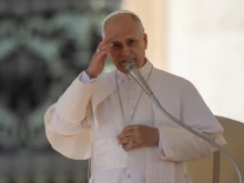 Pope Leo XIV gives his apostolic blessing at the end of the general audience in St. Peter’s Square on Nov. 12, 2025.
