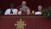 Pope Leo XIV delivers his Christmas "Urbi et Orbi" message at the Vatican on December 25, 2025.