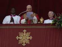 Pope Leo XIV delivers his Christmas "Urbi et Orbi" message at the Vatican on December 25, 2025.