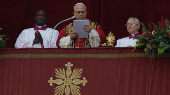Pope Leo XIV delivers his Christmas "Urbi et Orbi" message at the Vatican on December 25, 2025.