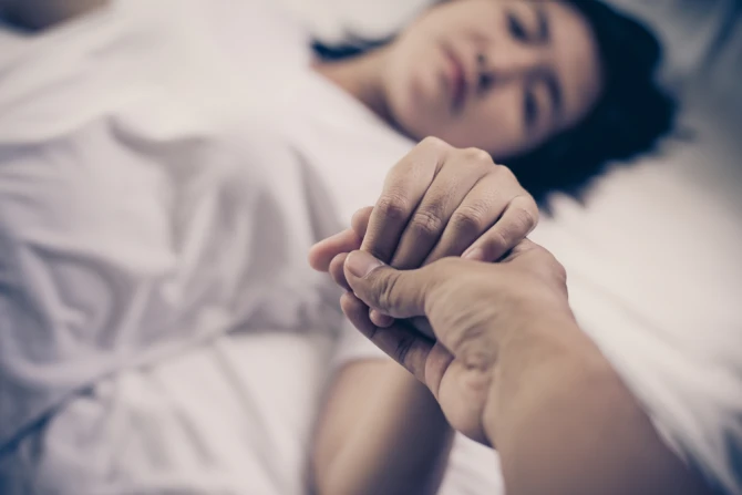 patient in hospital bed