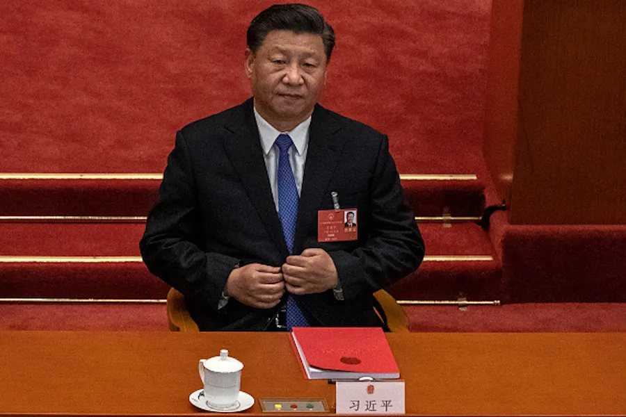 Chinese president Xi Jinping listens during a May 28 session of the National People's Congress, which included a vote on a new draft security bill for Hong Kong. ?w=200&h=150