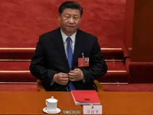 Chinese president Xi Jinping listens during a May 28 session of the National People's Congress, which included a vote on a new draft security bill for Hong Kong. 