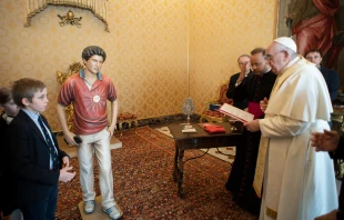 A lifesize statue of Blessed Carlo Acutis created by Matteo and Daniela Perathoner Vatican Media