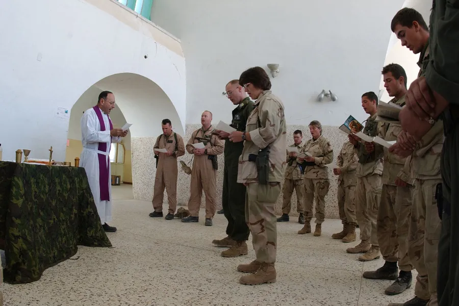 Mass for U.S. military personnel at a forward operating base in Kandahar, Afghanistan, Dec. 23, 2001.?w=200&h=150