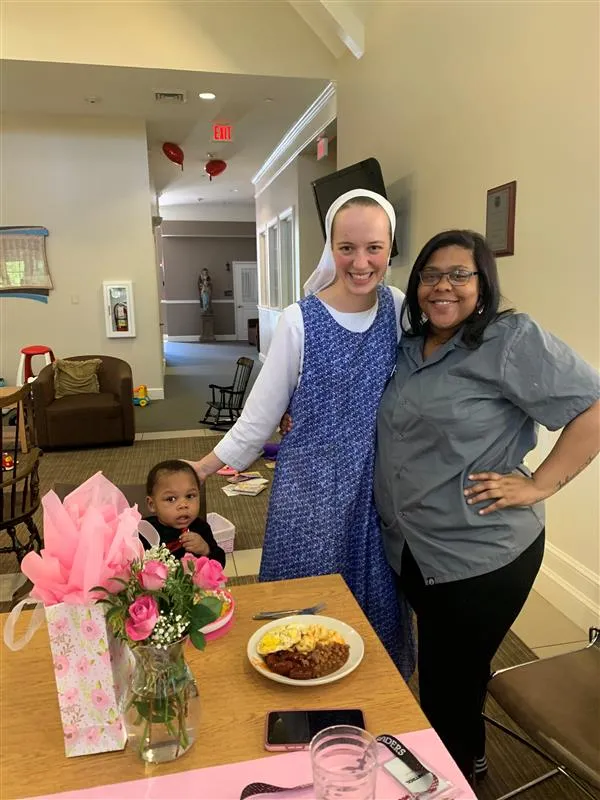 Ashley Banks and Jakori with MiraVia volunteer Sr. Mary Jacinta of the Daughters of the Virgin Mary, Feb. 14, 2020. Courtesy of MiraVia