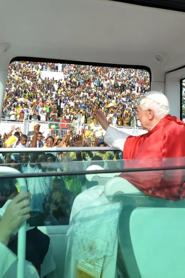 Pope Benedict XVI greets the thousands who gathered for Mass at the Friendship Stadium in Cotonou during his visit to Benin Nov. 18–20, 2011. Vatican Media.