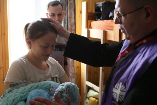 Caritas workers bring aid to people near Kyiv, Ukraine.