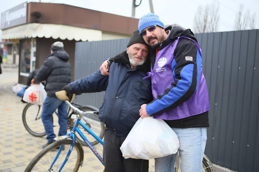 A Caritas-Spes worker brings aid to people near Kyiv, Ukraine.?w=200&h=150