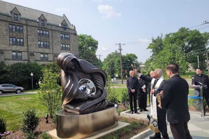 Cardinal Wilton Gregory of the Archdiocese of Washington, D.C., blesses the newly unveiled "National Life Monument" on the campus of The Catholic University of America's Theological College on May 17, 2023. | Peter Pinedo|CNA
