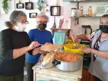Participants prepare food for “10,000 Christmases in one,” a joint initiative between the Archdiocese of Guadalajara, Mexico, and the Jewish community to provide 40,000 Christmas dinners for the poor on Dec. 25. The 2022 event, which is being held for the fourth consecutive year, will bring food from 40 parishes and a shelter to those most in need in the Guadalajara metropolitan area.