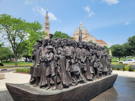 "Angels Unawares," another work by Schmalz on The Catholic University of America's campus, depicts 140 immigrants. Peter Pinedo|CNA