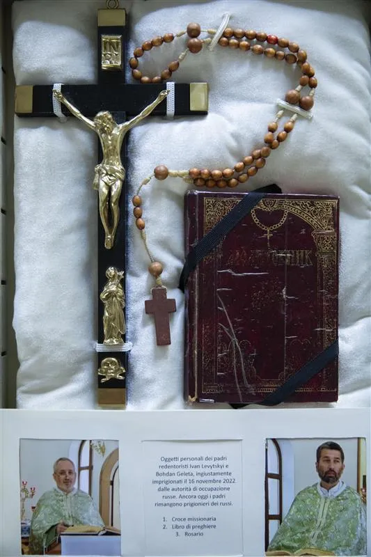 Major Archbishop Sviatoslav Shevchuk on Sept. 6, 2023, gave Pope Francis a prayer book, rosary, and missionary cross belonging to two Redemptorist priests, Father Ivan Levytskyi and Father Bohdan Heleta, captured by Russian troops in November 2022. Secretariat of His Beatitude Sviatoslav Shevchuk in Rome