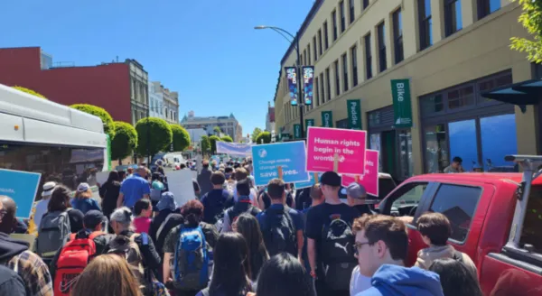 Participants at the March for Life in Victoria, British Columbia, walk down a street with signs calling for life to be respected at all stages. May 9, 2024. Credit: Paul Schratz