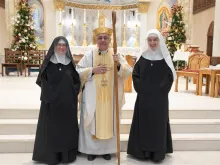 Mother Chiara Thérèse and Sister Lucia Rose of Servants of the Children of the Light after the ceremony with Bishop David Kagan of the Diocese of Bismarck, North Dakota.
